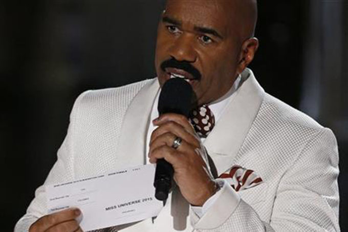 Steve Harvey holds up the card showing the winners after he incorrectly announced Miss Colombia Ariadna Gutierrez at the winner at the Miss Universe pageant Sunday Dec. 20 2015 in Las Vegas. According to the pageant a misreading led the announcer to