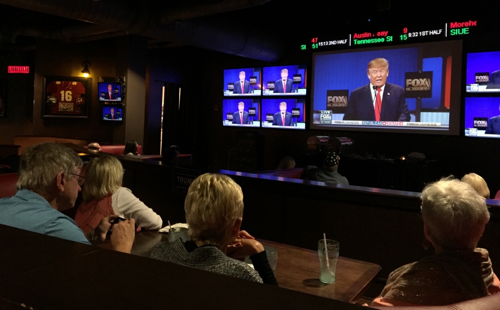 Donald Trump supporters watch Thursday night's debate at Revolutions in West Palm Beach