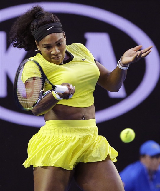 Serena Williams of the United States hits a forehand return to Daria Kasatkina of Russia during their third round match at the Australian Open tennis championships in Melbourne Australia Friday Jan. 22 2016