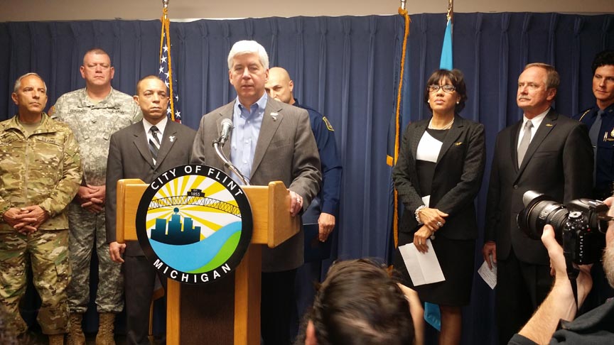 Gov. Rick Snyder addresses the media during an announcement of new resources for Flint