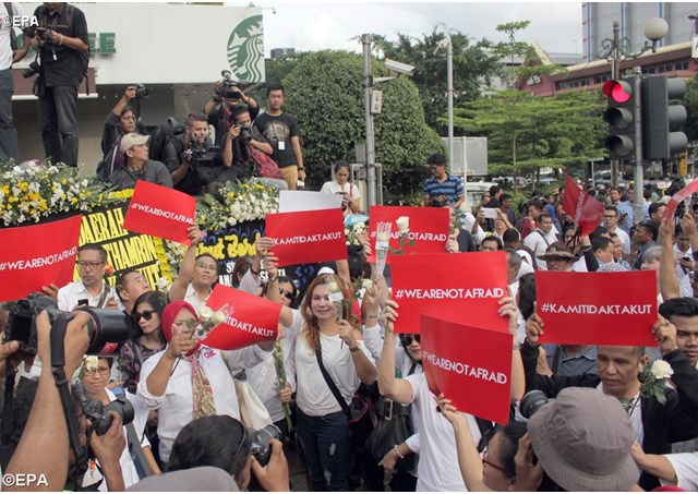 Indonesian activists demonstrating against the Jan. 14 2016 terrorist attack in Jakarta.- EPA