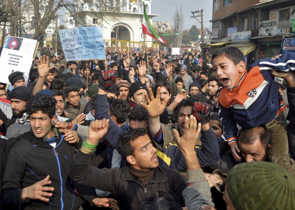 Kashmiri Shia Muslims shout slogans during a protest in Srinagar yesterday against the execution of cleric Nimr al-Nimr who was executed in Saudi Arabia. – Reuters pic