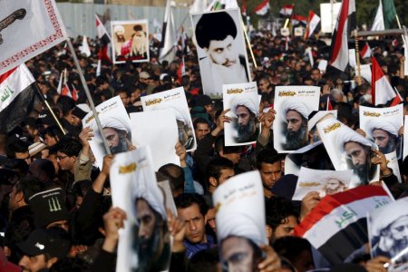 Supporters of Shi'ite cleric Moqtada al Sadr protest against the execution of Shi'ite Muslim cleric Nimr al Nimr in Saudi Arabia during a demonstration in Baghdad