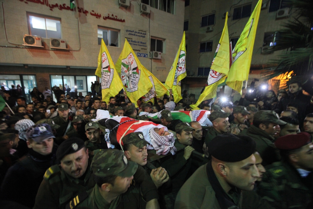 Palestinians carry the body of 16-year-old Mamoon Raed Muhammed al-Khatib,and the body of Essam Thawabteh,two young alleged Palestinians attackers whose bodies were held by Israeli forces in Bethlehem on Sunday. Since a wave of unrest swept the occupied