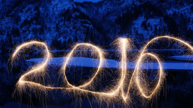 The numbers '2016&#39 are written in the air with a sparkler on a bank of the Yenisei River in the Taiga district near the town of Divnogorsk outside Siberian city of Krasnoyarsk Russia on Dec. 31 2015