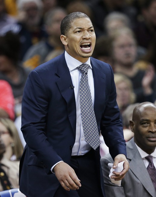 Cleveland Cavaliers coach Tyronn Lue yells to players during the second half of the team's NBA basketball game against the San Antonio Spurs Saturday Jan. 30 2016 in Cleveland. The Cavaliers won 117-103