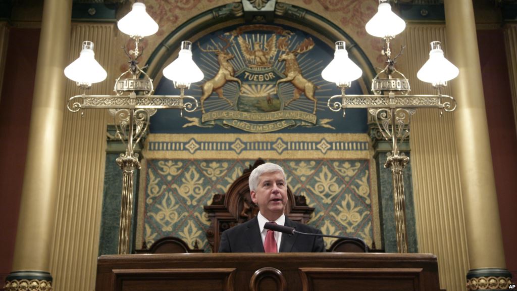 Michigan Gov. Rick Snyder delivers his State of the State address to a joint session of the House and Senate at the state Capitol in Lansing Mich. Jan. 19 2016