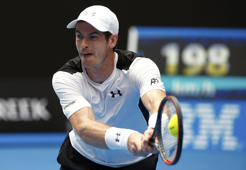 Britain's Murray hits a shot during his second round match against Australia's Groth at the Australian Open tennis tournament at Melbourne Park