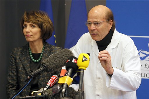 French Health Minister Marisol Touraine left and Professor Gilles Edan the chief neuroscientist at Rennes Hospital address the media during a press conference held in Rennes western France Friday Jan. 15 2016. Six previously healthy medical volunt