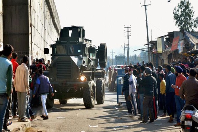 Pathankot An armored vehicle moves near the Indian Air Force base that was attacked by militants in Pathankot Punjab on Saturday. PTI