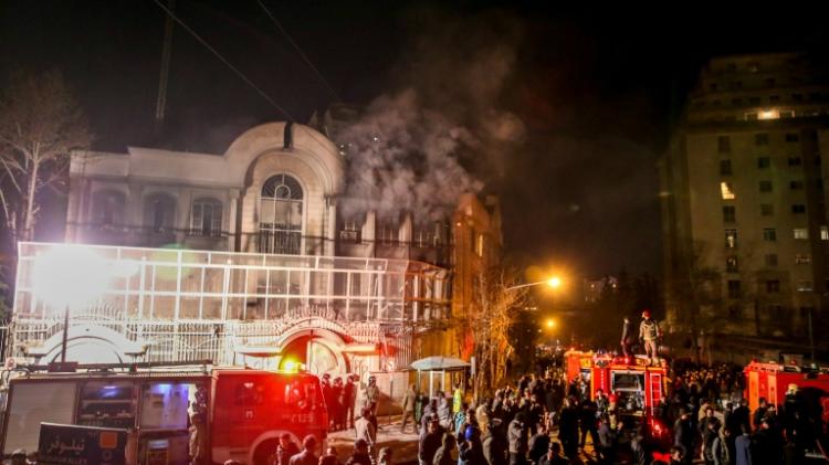 Iranian protesters set fire to the Saudi Embassy in Tehran during a demonstration against the execution of prominent Shiite Muslim cleric Nimr al Nimr by Saudi authorities