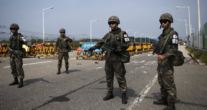 South Korean soldiers stand guard at a checkpoint on the Grand Unification Bridge which leads to the truce village Panmunjom just south of the demilitarized zone separating the two Koreas in Paju South Korea