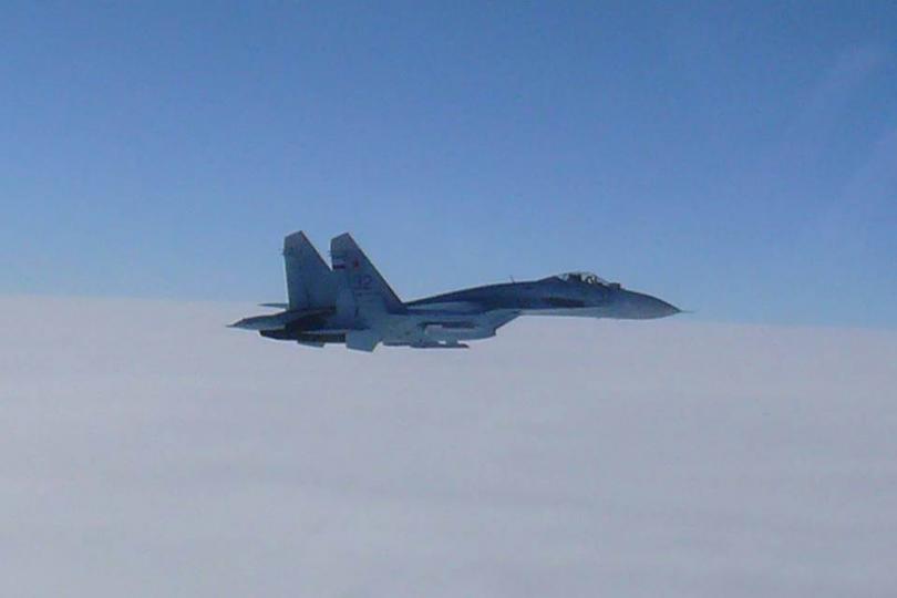 An Su-27 flying near to the sea of Japan