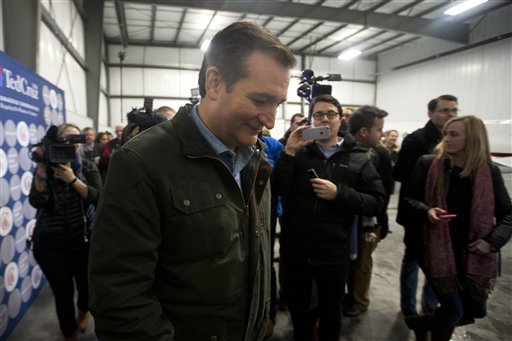 Republican presidential candidate Sen. Ted Cruz R-Texas leaves an airport hanger after talking to reporters Thursday Jan. 7 2016 in Webster City Iowa