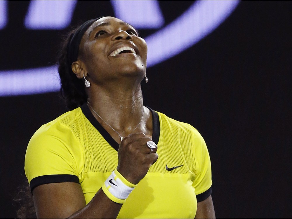 Serena Williams of the United States celebrates after defeating Agnieszka Radwanska of Poland in their semifinal match at the Australian Open tennis championships in Melbourne Australia Thursday Jan. 28 2016