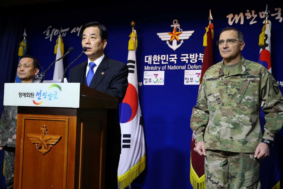 South Korean Defense Minister Han Min-koo center speaks during a press conference as U.S. Forces Korea Commander Curtis Scaparrotti right listens at the Defense Ministry in Seoul South Korea Thursday Jan. 7 2016. In response to North Korea’s lat