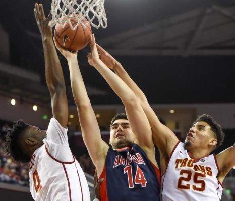 Arizona center Dusan Ristic battles Southern California