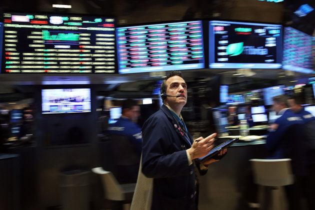 Spencer Platt via Getty Images
Traders work on the floor of the New York Stock Exchange