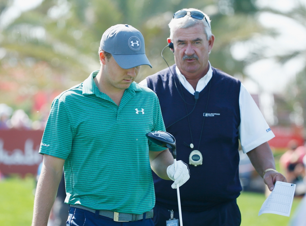 ABU DHABI UNITED ARAB EMIRATES- JANUARY 21 European Tour chief rules official John Paramor chats with Jordan Spieth of the United States on the ninth hole during the first round of the Abu Dhabi HSBC Golf Championship at the Abu Dhabi Golf Club on Jan