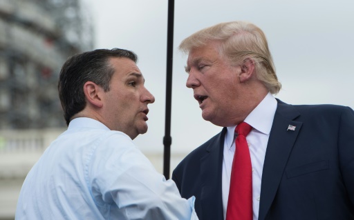 US Republican presidential candidate Donald Trump is greeted on stage by fellow Republican candidate Ted Cruz before speaking at a rally against the Iran nuclear deal in Washington DC