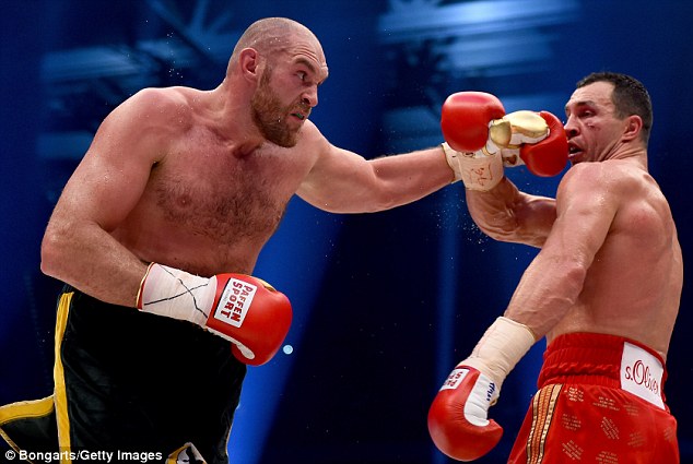 Tyson Fury outpointed Wladimir Klitschko in Germany to become the unified world heavyweight champion