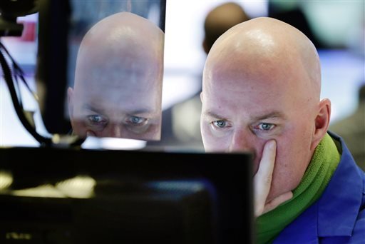 Specialist John O'Hara works at his post on the floor of the New York Stock Exchange Thursday Jan. 7 2016. U.S. stocks are opening sharply lower as worries intensify about China's economy and dropping oil prices