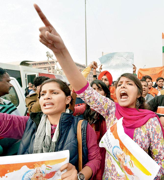 ABVP activists protest against an event at JNU supporting Parliament attack convict Afzal Guru in New Delhi. Pic  PTI