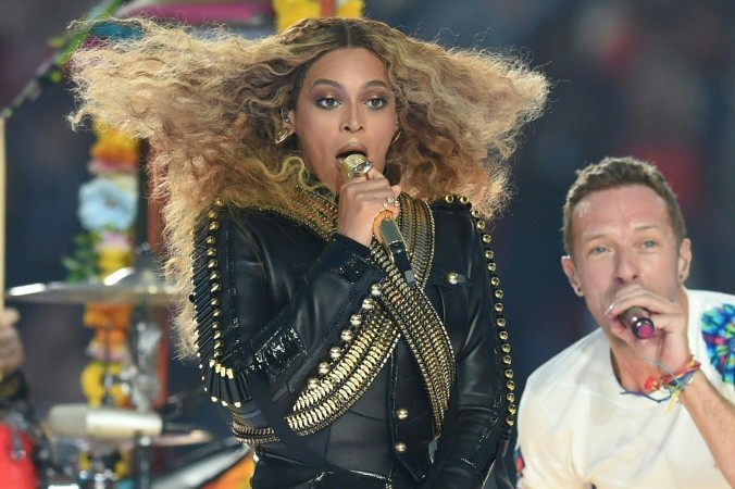 Beyonce and Chris Martin perform during Super Bowl 50 between the Carolina Panthers and the Denver Broncos at Levi's Stadium in Santa Clara California