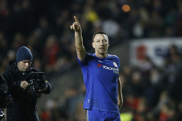 Chelsea's captain John Terry acknowledges the fans as he celebrates after the final whistle of the English FA Cup fourth round soccer match between Milton Keynes Dons and Chelsea at Stadium mk in Milton Keynes England Sunday Jan. 31 2016. Chelsea won