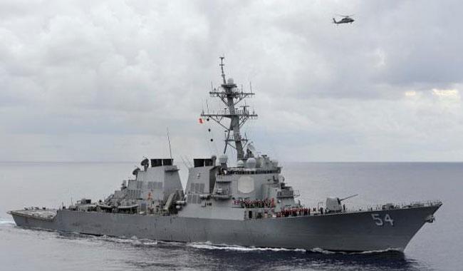 US warship sails near island claimed by China in South China Sea