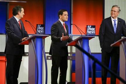 Republican presidential candidate Sen. Marco Rubio R-Fla. center answers a question as Sen. Ted Cruz R-Texas left and former Florida Gov. Jeb Bush right listen during a Republican presidential primary debate Thursday Jan. 28 2016 in Des Moines