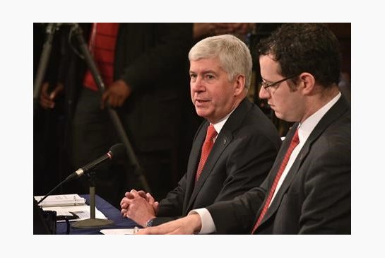 Governor Rick Snyder presents the budget to the combined House and Senate Appropriations committees in the Capitol in Lansing Mich. on Wednesday Feb 10 2016. The budget contains special funding for Flint's water problems and Detroit Public Schools. (D