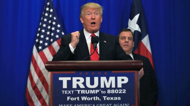 Republican presidential candidate Donald Trump announces that New Jersey Governor Chris Christie officially supports the Trump campaign during a rally at the Fort Worth Convention Center