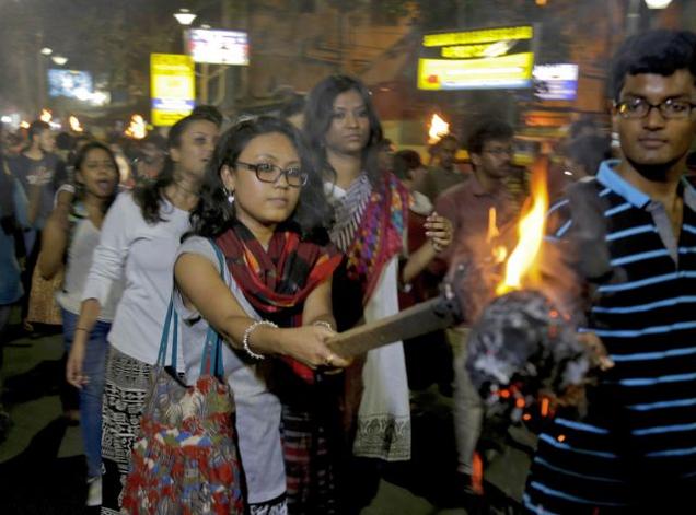 Students of Jadavpur University during a torch light protest against the arrest of JNU student union leader Kanhaiya Kumar in Kolkata on Tuesday