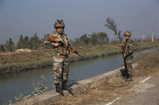 Guarding the water Indian military guard the Munak canal near the village of Bindroli in the northern state of Haryana Monday Feb. 22 2016. Fears of a water crisis in the Indian capital eased Monday with security forces securing a canal in Haryana