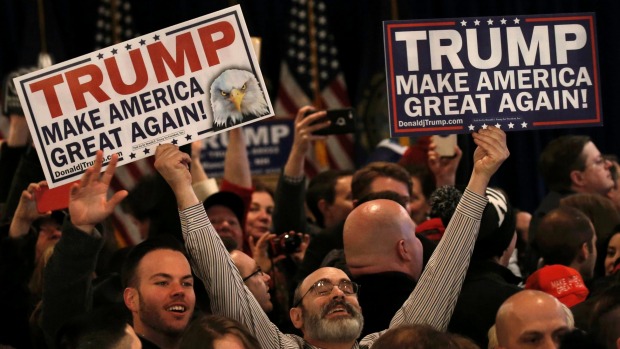 Donald Trump supporters celebrate the projected win