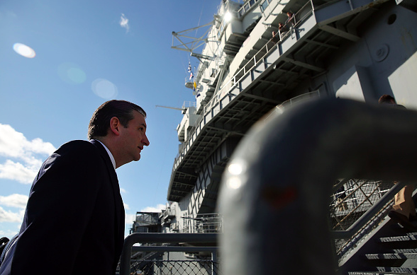 Republican presidential candidate Ted Cruz walks onto the USS Yorktown to give a speech on international security and expanding the U.S. military