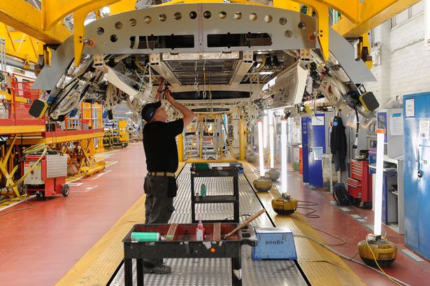 Workers at the Bombardier plant in Derby after the train manufacturer won the contract to provide trains for the London Crossrail project