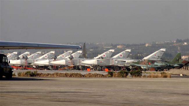 A general view shows Russian fighter jets on the tarmac at the Russian Hmeimim military base in Latakia Province in the northwest of Syria