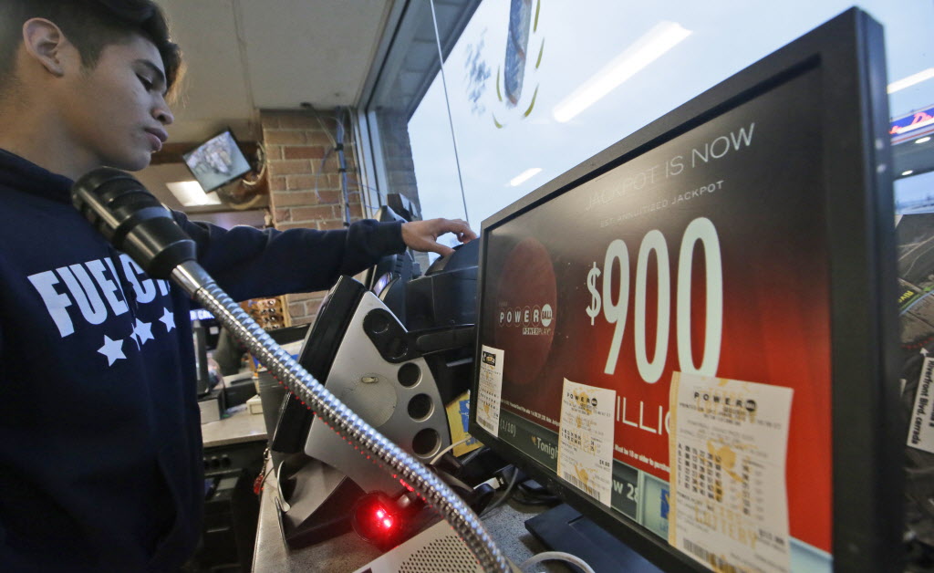 A Powerball lottery ticket is printed at a gas station in Dallas Jan. 9. Ticket sales for the multi-state Powerball lottery soared in the largest jackpot in U.S. history which grew to $900 million just hours before the drawing