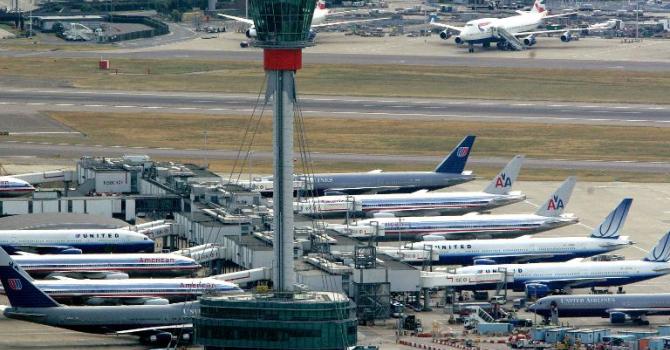 Aeroplanes sit on the tarmac at Heathrow Airport in London August 10 2006