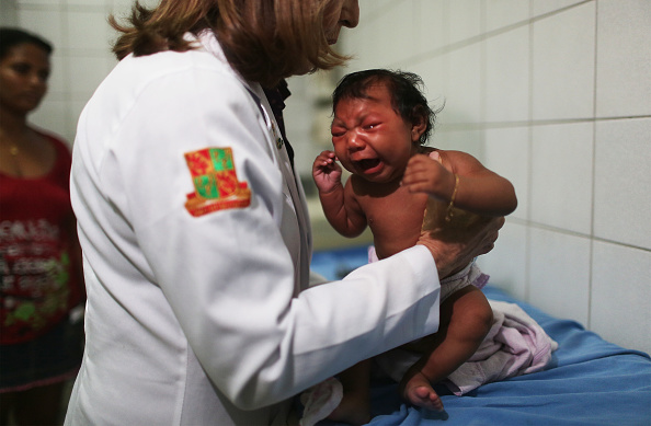 Dr. Angela Rocha, pediatric infectologist at Oswaldo Cruz Hospital examines Ludmilla Hadassa Dias de Vasconcelos, who has microcephaly