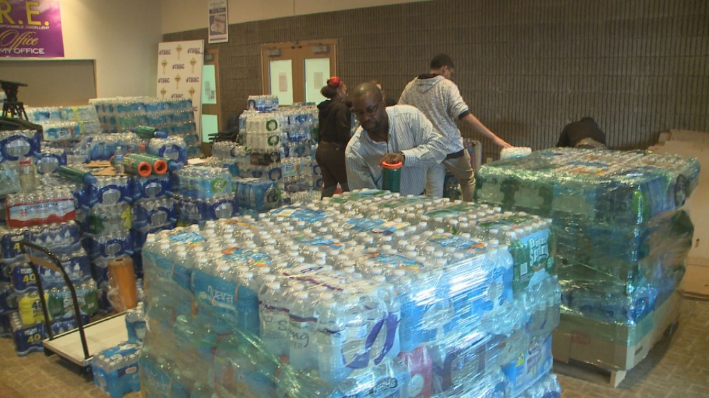 Water collected at True Bethel Baptist Church is readied for shipment to Michigan