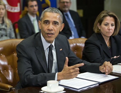 President Barack Obama meets with members of this national security team and cybersecurity advisers in the Roosevelt Room of the White House in Washington,Tuesday Feb. 9 2016. At right is Lisa Monaco assistant to the president for Homeland Security and