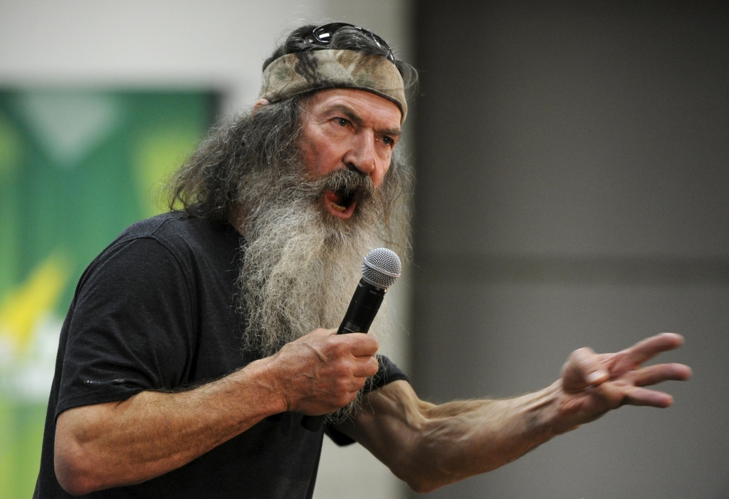 Duck Dynasty star Phil Robertson fires up the crowd by attacking President Obama before Republican presidential candidate Sen. Ted Cruz takes the stage at Western Iowa Tech Community College in Sioux City on Saturday. Dave Kaup | Reuters