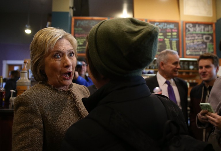 Democratic presidential candidate former secretary of state Hillary Clinton greets patrons at Mapps Coffee