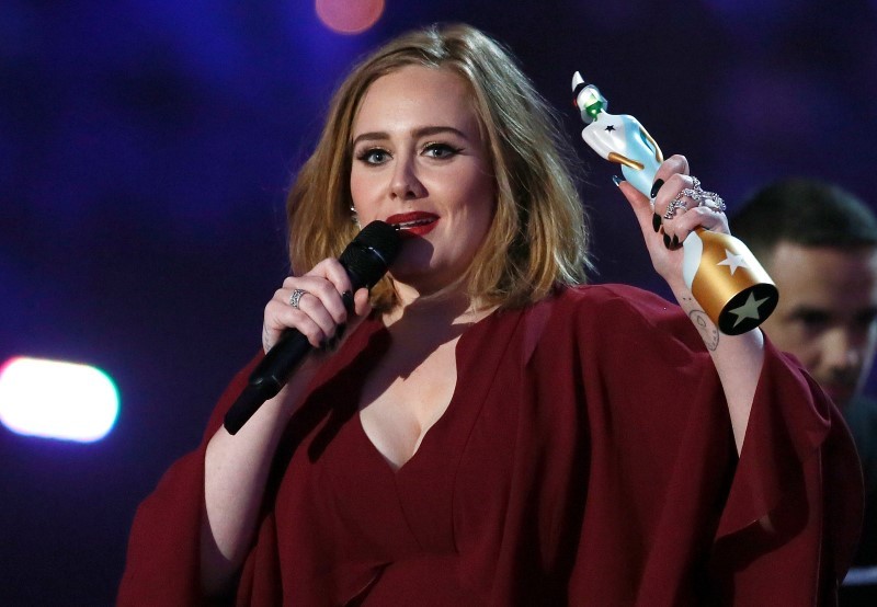 British singer and songwriter Adele accepts the award for best British female solo artist at the BRIT Awards at the O2 arena in London Britain