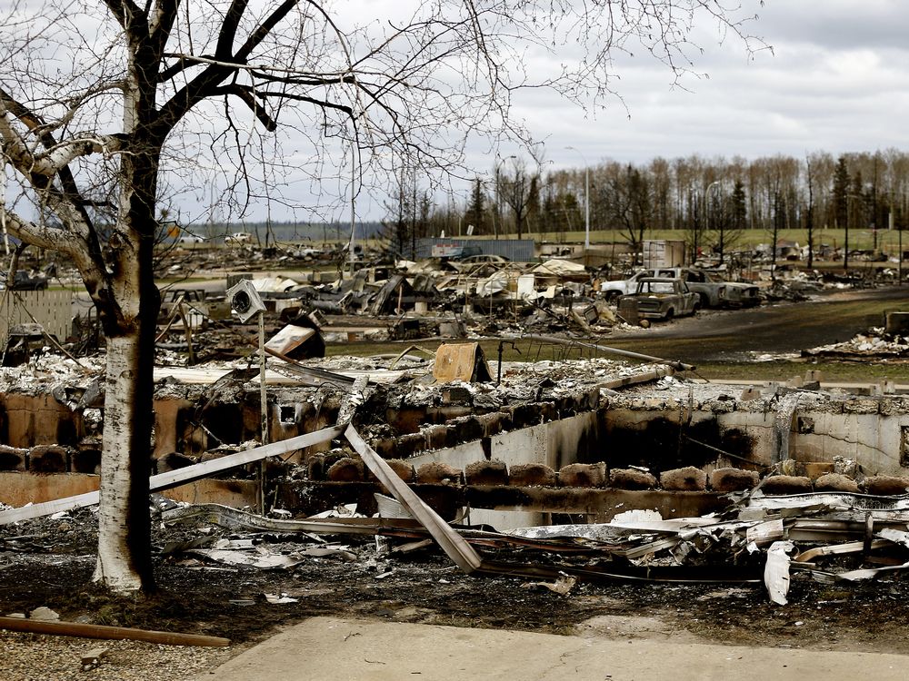 A fire ravaged Beacon Hill neighborhood in Fort Mc Murray on May 9. Insurance Bureau of Canada executives said Thursday it's too early to estimate the losses