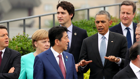 Japanese Prime Minister Shinzo Abe chats with U.S. President Barack Obama