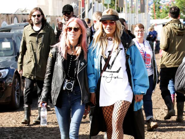 Adele drops lots of f-bombs as she kicks off her Glastonbury set but everybody adores her